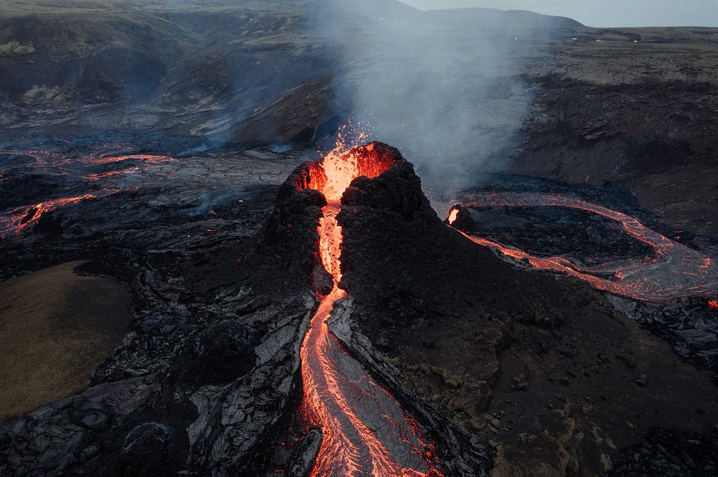Eruption volcano with flowing lava in Iceland.