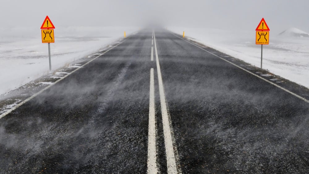 Image of a road in Iceland in windy and snowy conditions