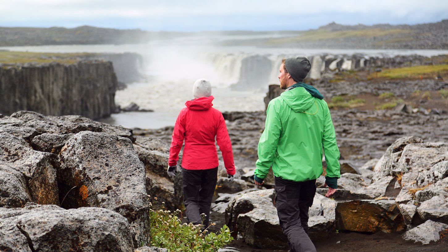 Man and woman hiking in Iceland