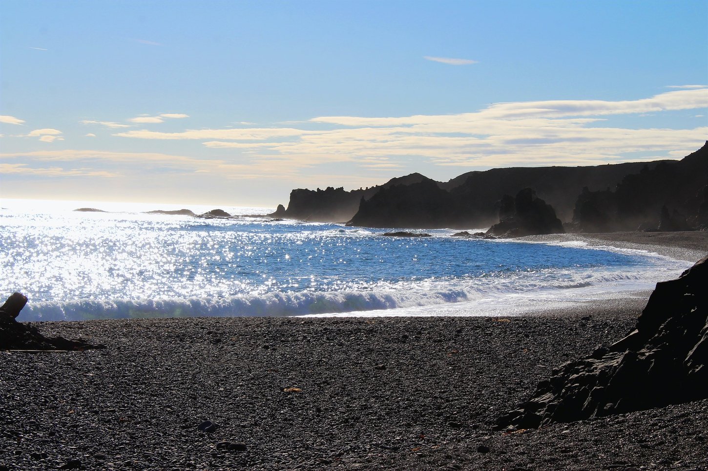 Coastline at Djúpalónssandur beach in Iceland on a sunny day