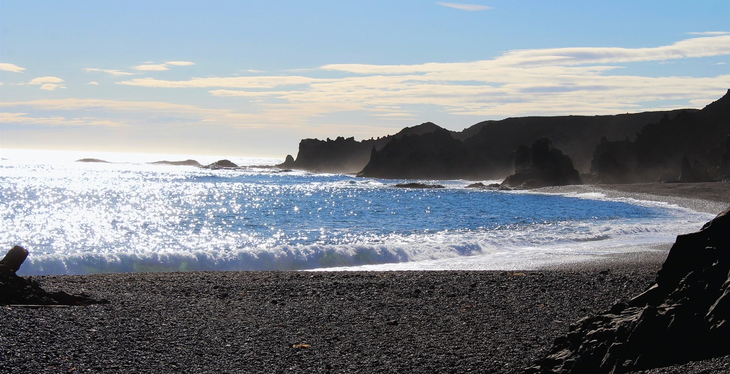 Coastline at Djúpalónssandur beach in Iceland on a sunny day