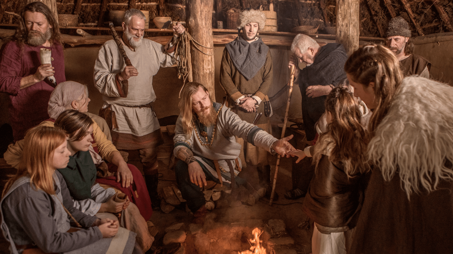 Viking family recreation in a wooden house