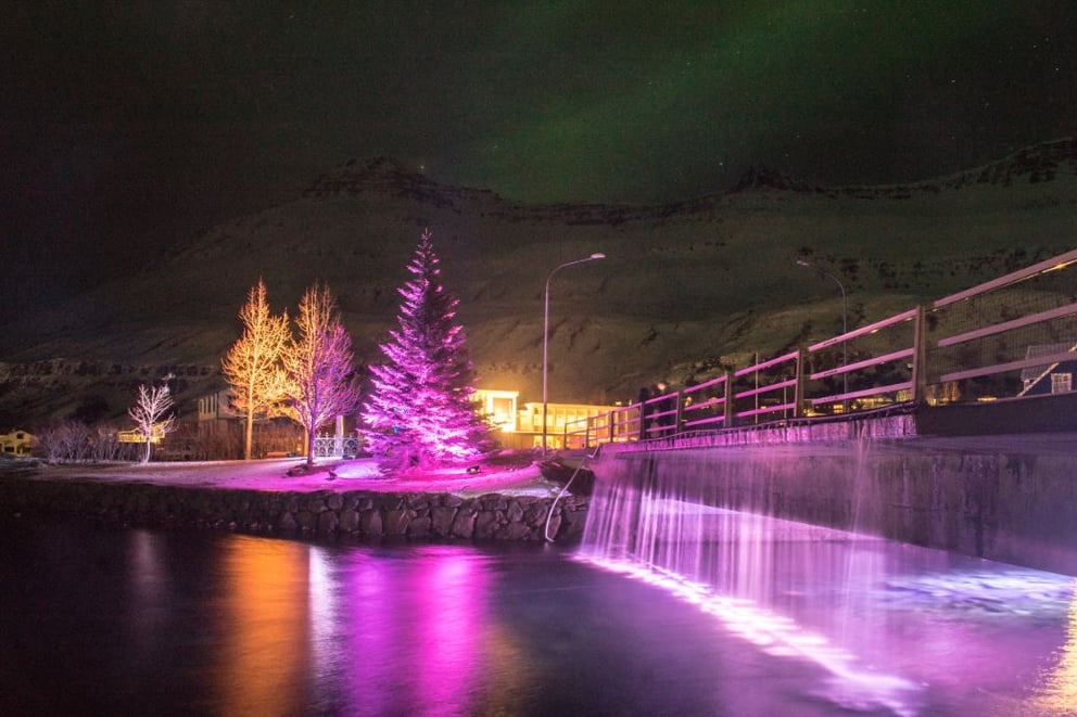 River in purple lights in Iceland.