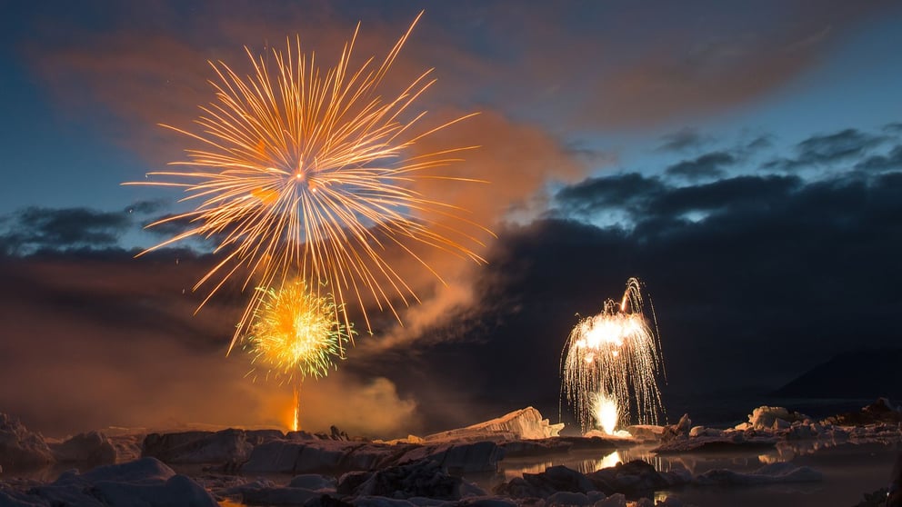Fireworks display over Jökulsárlón Glacier Lagoon, Iceland.