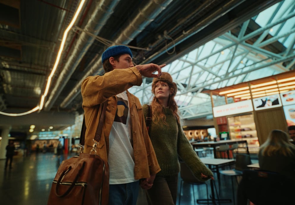 Image of two people inside Keflavik Airport