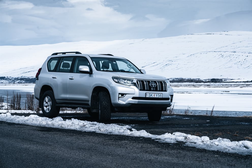 Land cruiser in a snowy road in Iceland