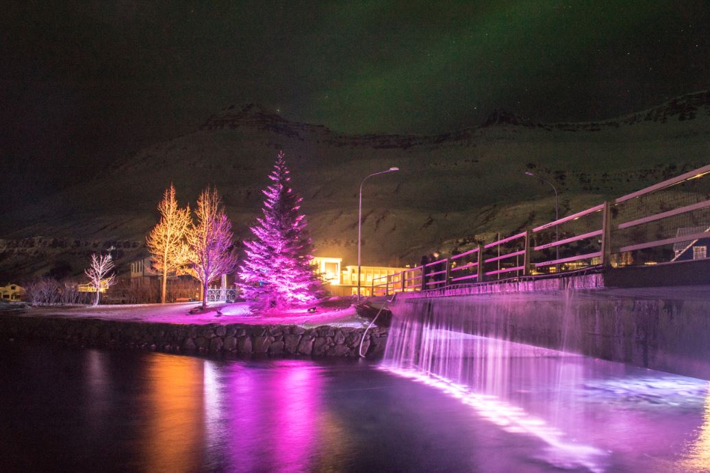 River in purple lights in Iceland.