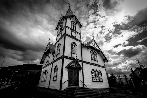 Black and white photo of Husavikurkirkja church, Husavik
