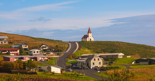 Iconic red-roofed church of Vik, a small town in Iceland.
