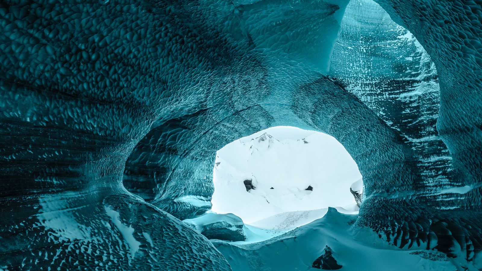 Blue ice formations inside Katla Ice Cave.