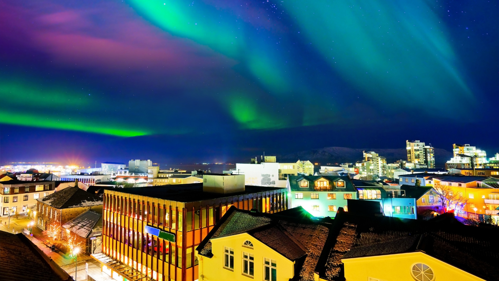 Northern Lights seen from the city centre in Reykjavík.