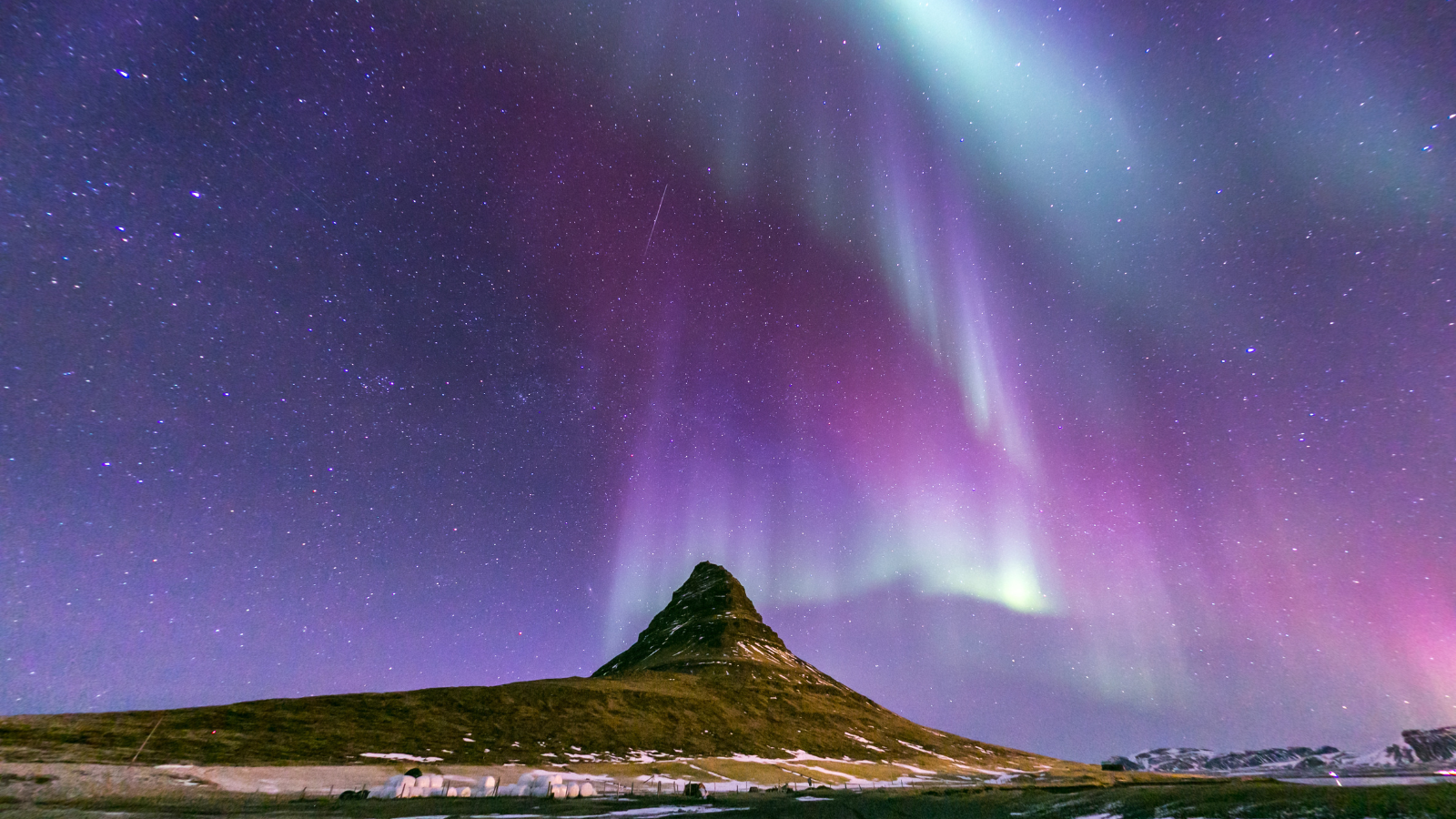 Northern Lights overhead at Kirkjufell, Iceland.