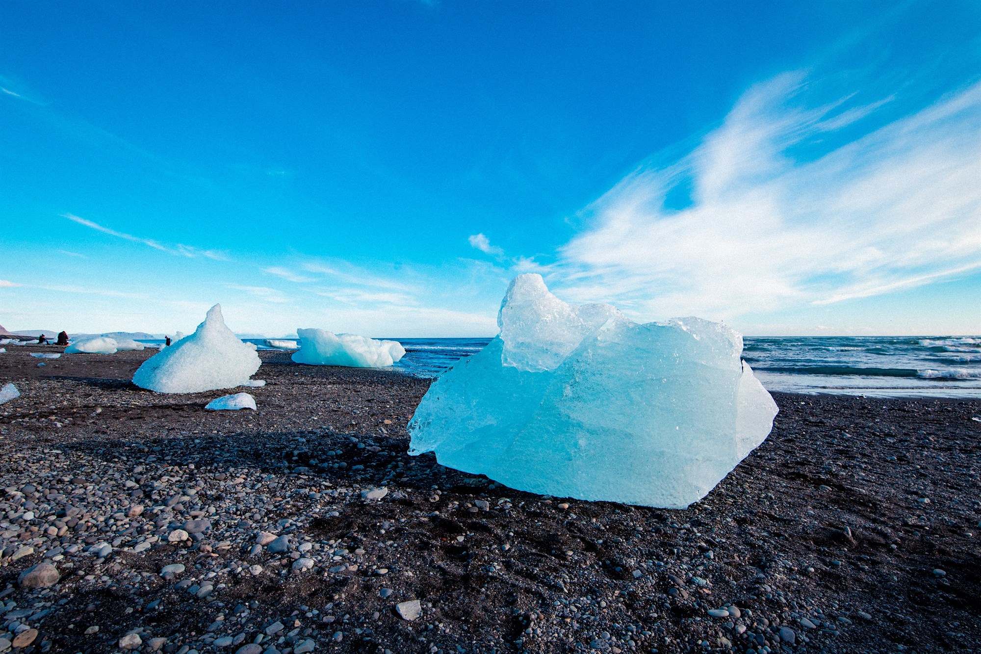 Ice block on the black sands of Diamond Beach in Iceland