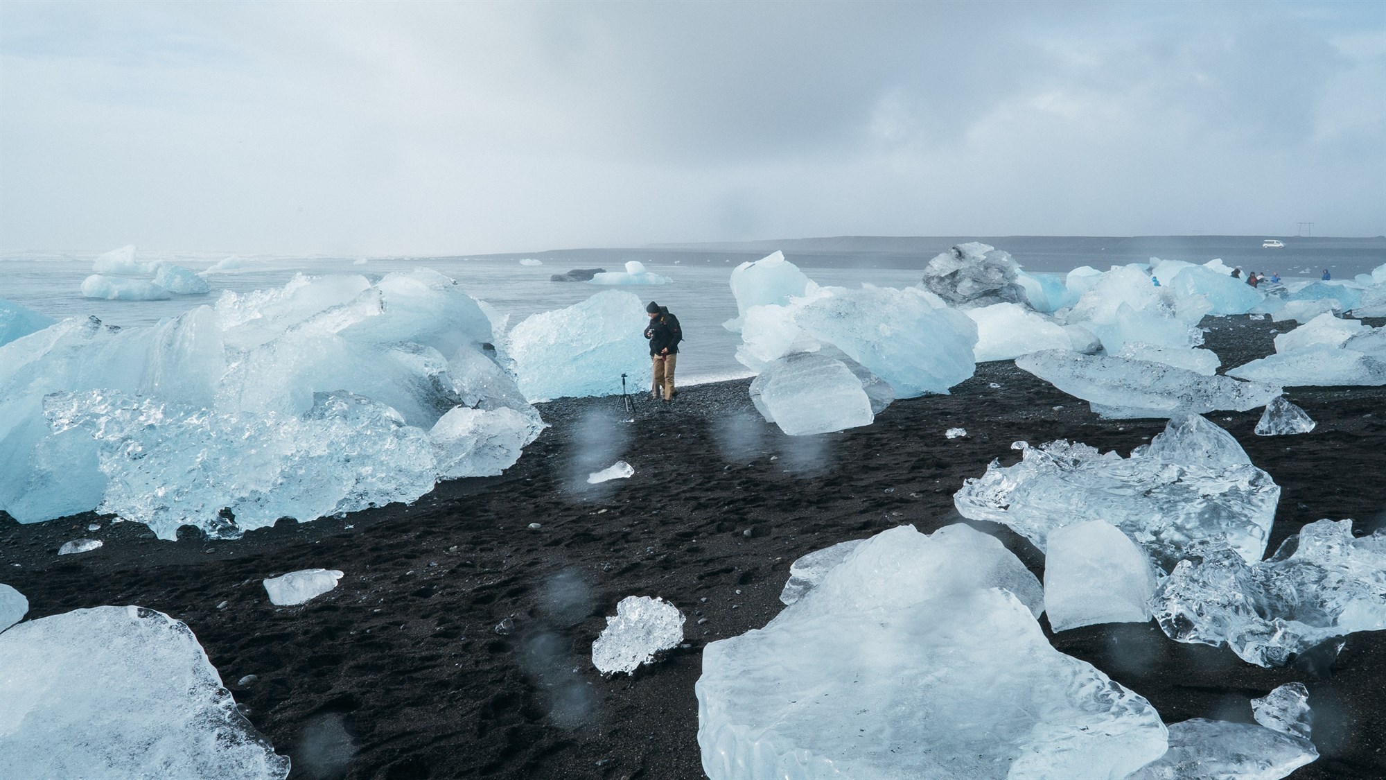 Photographer at the Diamond Beach in Iceland