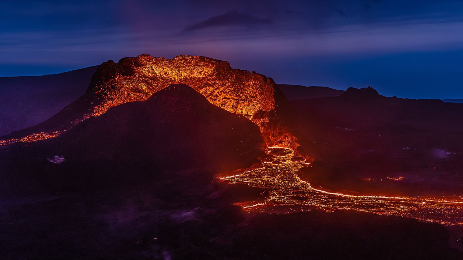 Flowing lava at the Fagradalsfjall volcano eruption in Iceland.